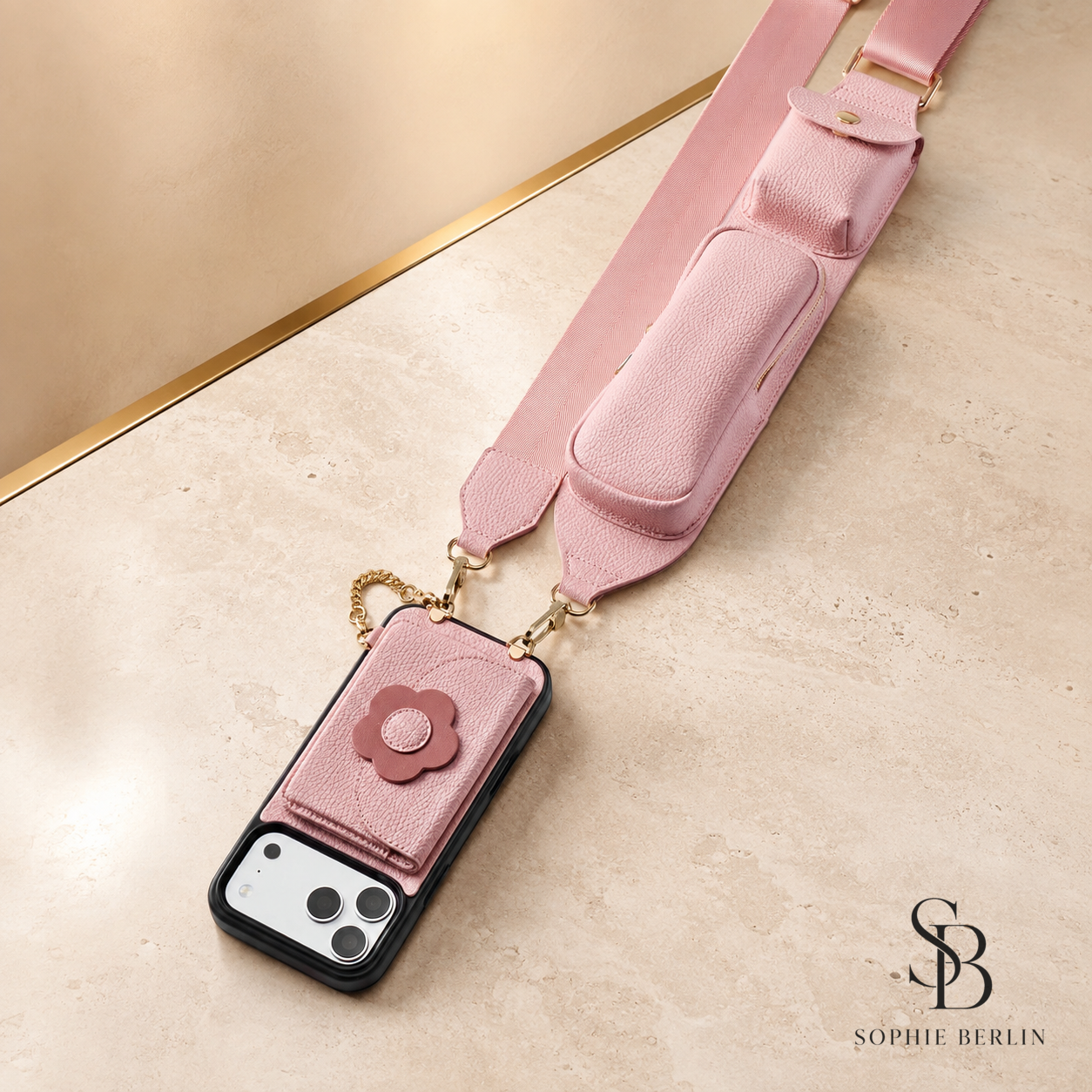 Rosa Crossbody-Handyhülle mit schwarzem Sophie-Berlin-Logo